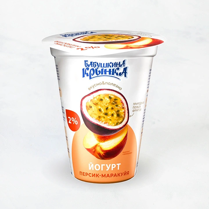 Йогурт 2% 310г персик-маракуйя п/стак Бабушкина крынка 