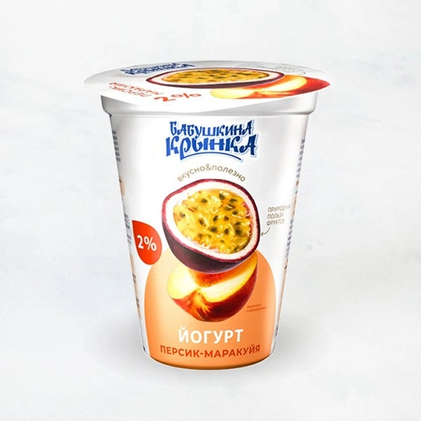 Йогурт 2% 310г персик-маракуйя п/стак Бабушкина крынка 